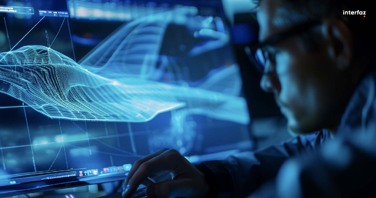 A man is working on a computer screen with a blue image of a wave. He is typing on a keyboard