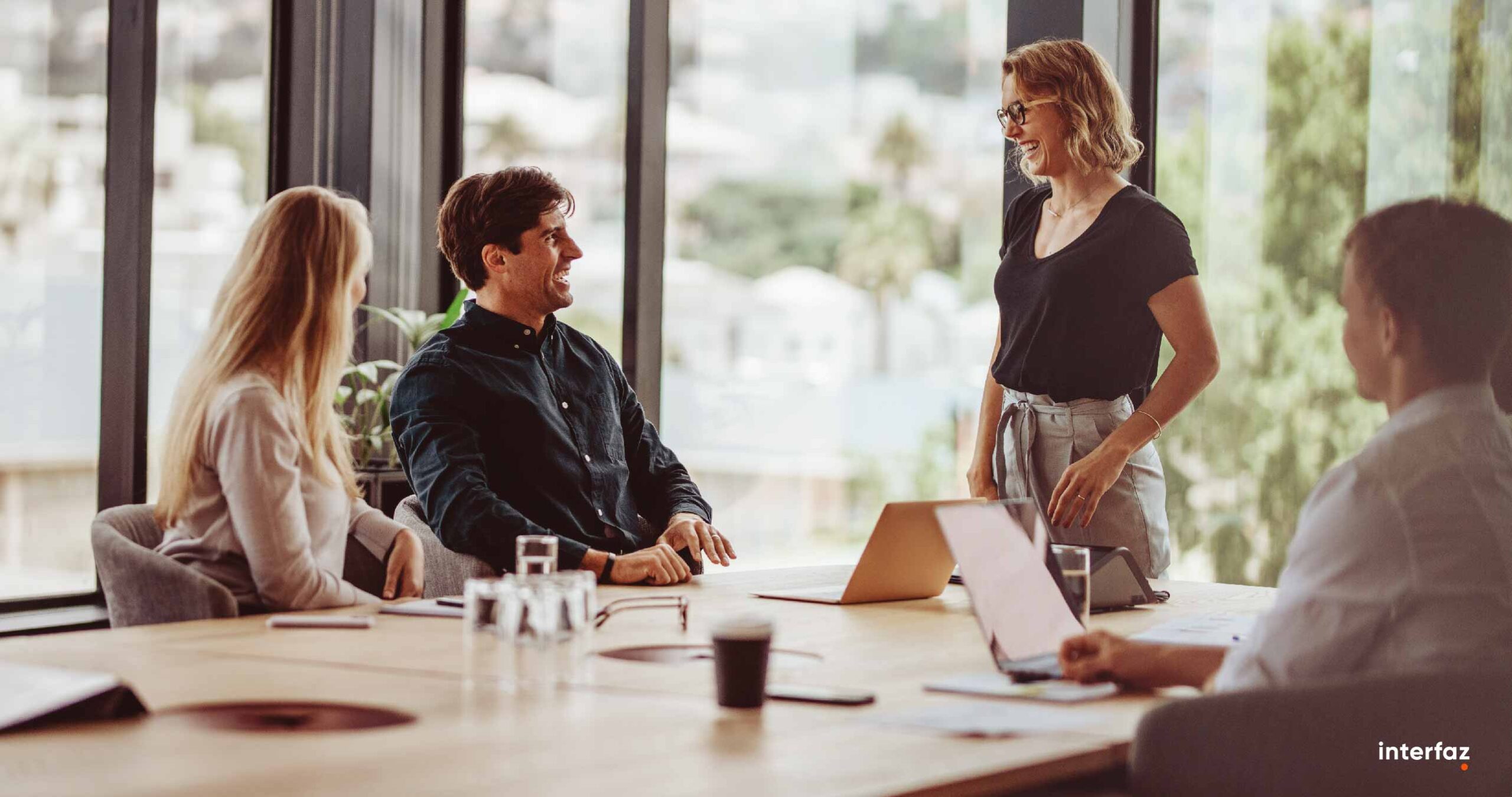 Group of happy corporate people in a meeting