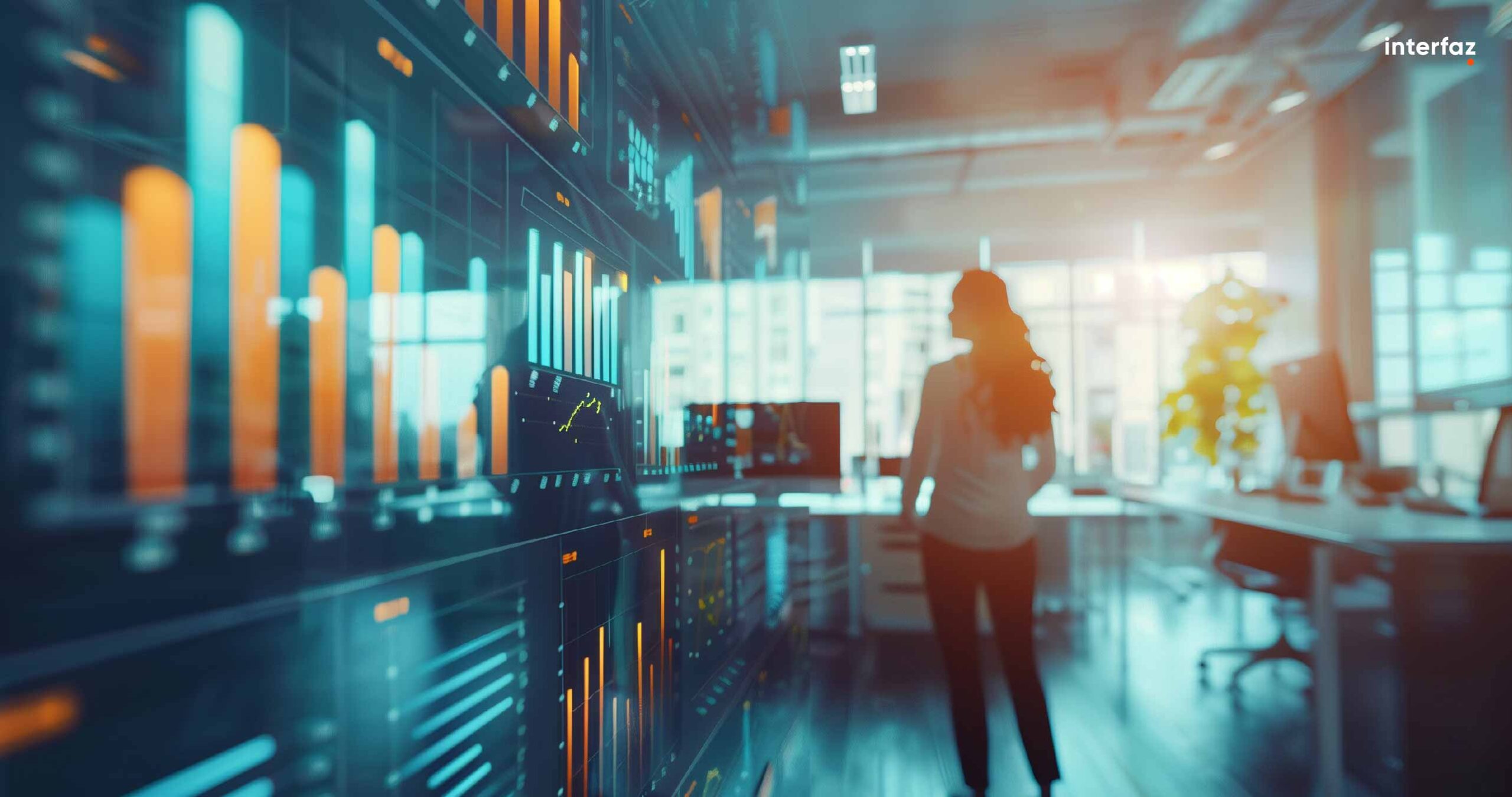 Business people in a bright office room with floating business charts graphics